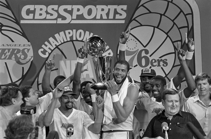 Abdul-Jabbar with the NBA Championship in 1982