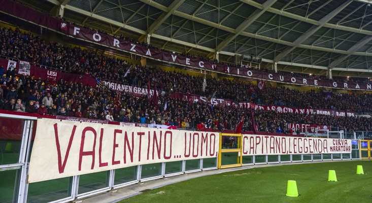 Supporters of Torino FC show a banner for Valentino Mazzola on the week of the 100th anniversary of his birth