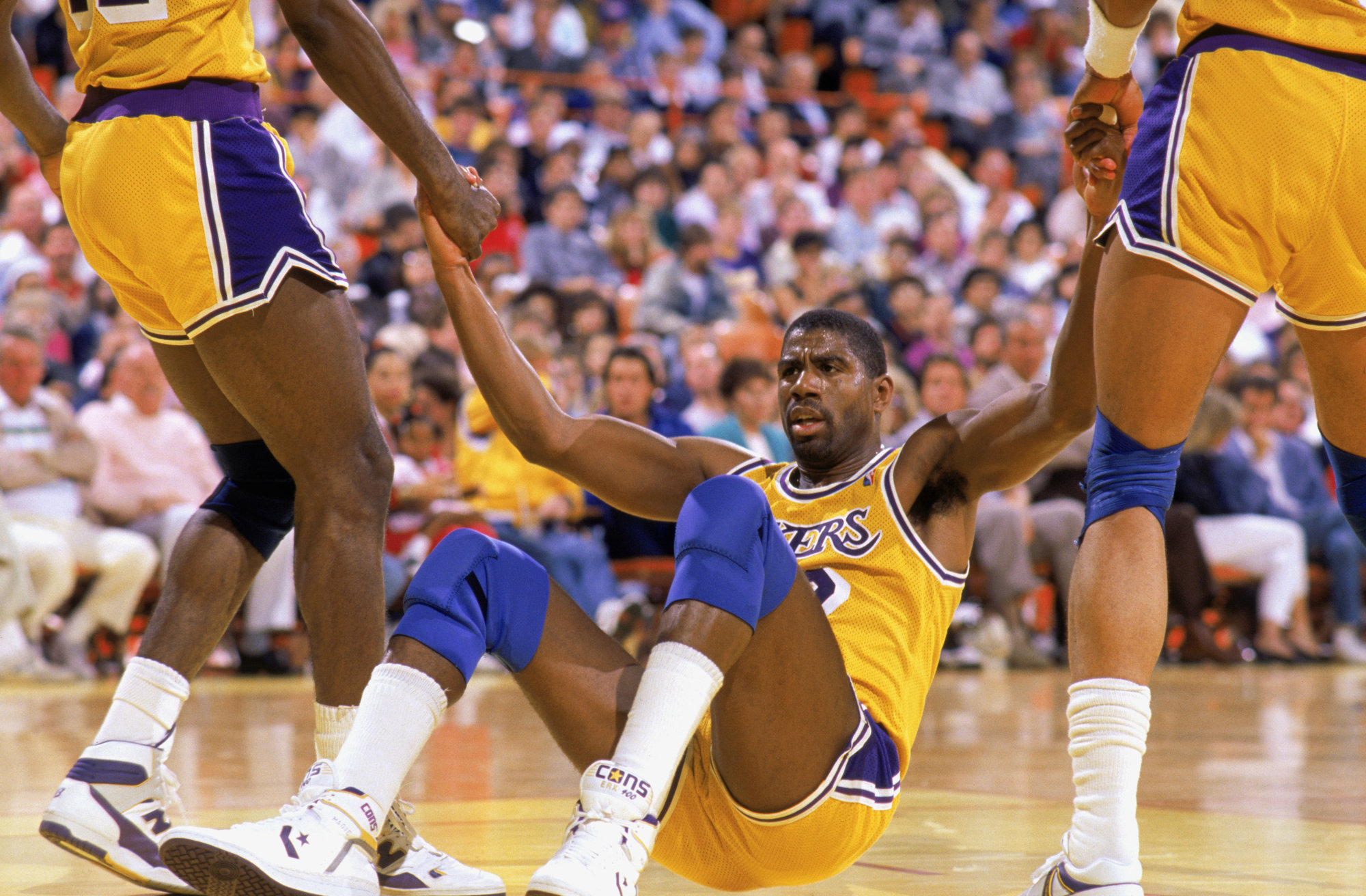 Magic Johnson #32 of the Los Angeles Lakers and Michael Jordan #23