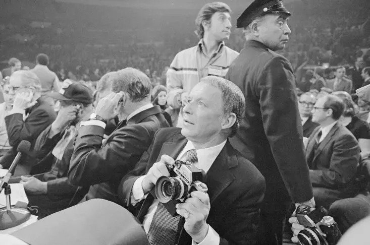 FRANK SINATRA GETS SOME SNAPS OF 'THE FIGHT OF THE CENTURY' FOR LIFE MAGAZINE
