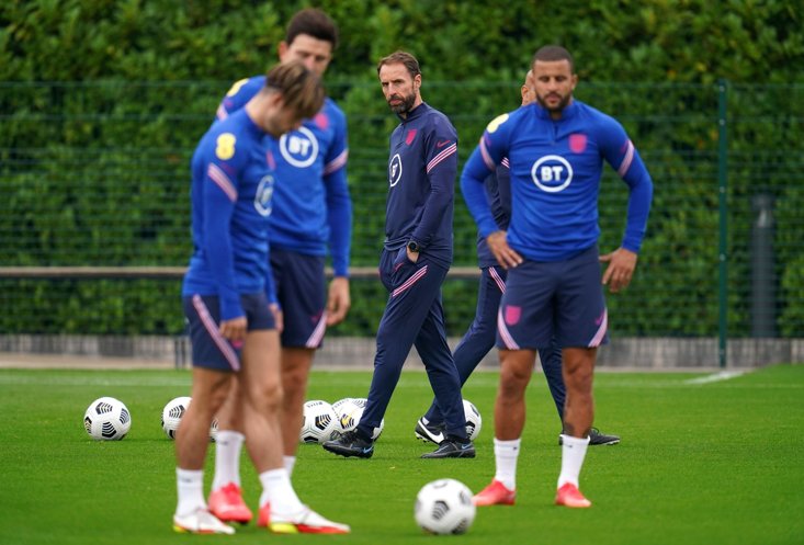 England manager Gareth Southgate watches over training