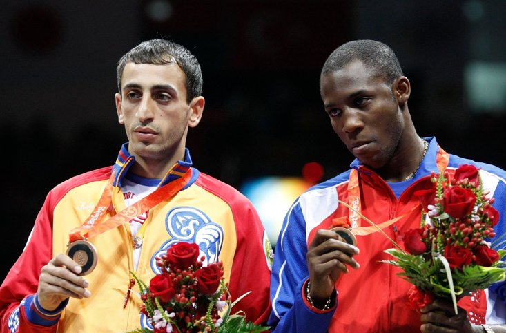 Ugas (Right) wins bronze at the Beijing Olympics 