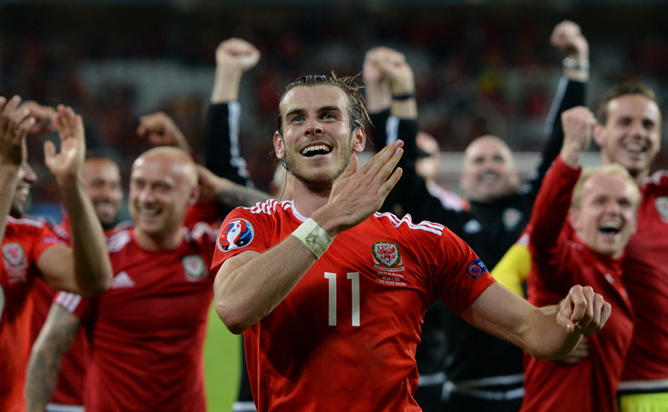 Bale celebrates beating Belgium at Euro 2016