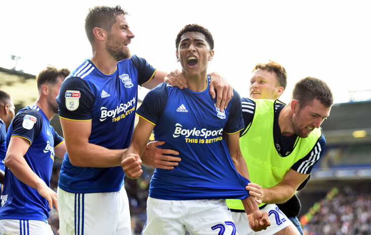 Bellingham celebrating his first professional goal against Stoke City