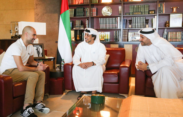 Man City owner Sheikh Mansour (centre) with the club's manager Pep Guardiola
