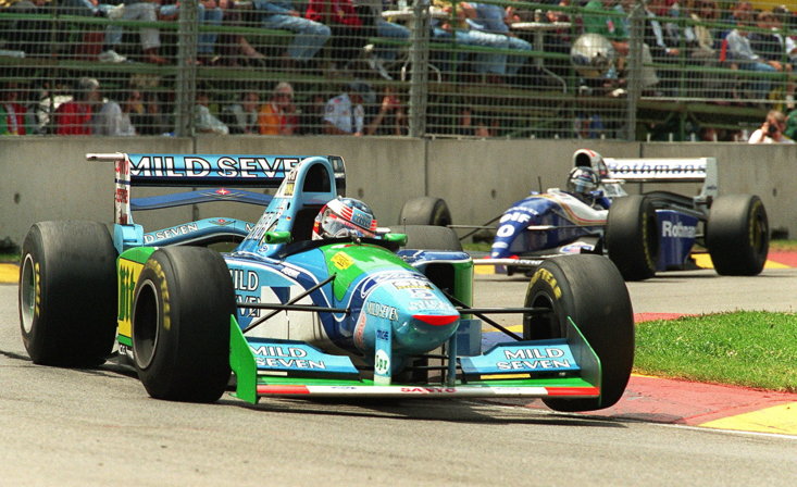 SCHUMACHER (FRONT) AND HILL (REAR) COLLIDED IN THE FINAL RACE OF 1994