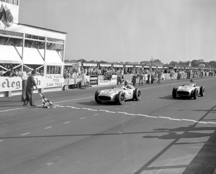 Moss pipped teammate Fangio to the chequered flag