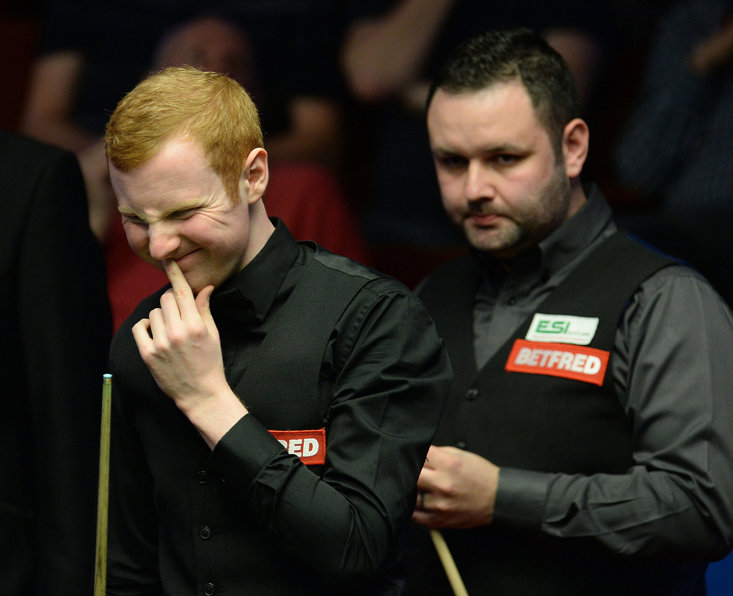 Anthony McGill (left) and Stephen Maguire during the 2015 Betfred World Championships 